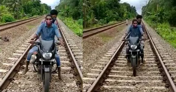 കണ്ടെയ്ൻമെന്റ് സോണില്‍നിന്നു പുറത്തു കടക്കാന്‍ റെയില്‍വേ ട്രാക്കിലൂടെ യുവാക്കളുടെ സാഹസിക ബൈക്ക് യാത്ര