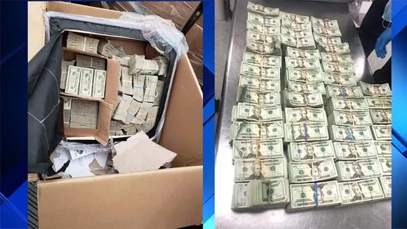 കസേരയുടെ കുഷ്യനിൽ ഒളിപ്പിച്ചുവച്ച 500,000 ഡോളർ പിടിച്ചെടുത്തു