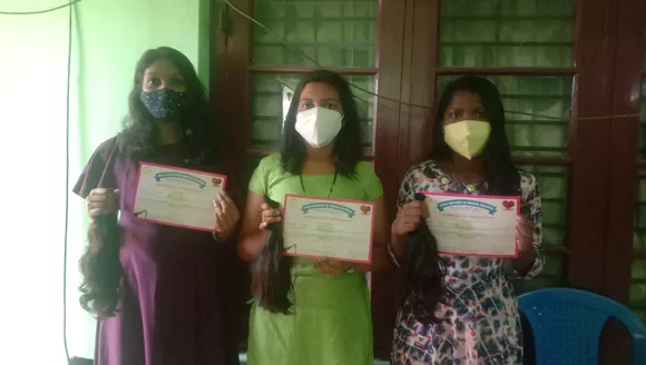 വനിതാദിനത്തിൽ മുടി ദാനം ചെയ്ത് പുതുവേലി സ്കൂളിലെ വിദ്യാർത്ഥിനികൾ