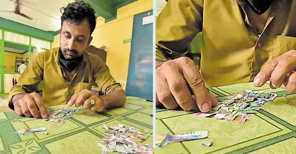 സമ്മാനമില്ലെന്ന് വിചാരിച്ച്‌ കീറിയെറിഞ്ഞ ടിക്കറ്റില്‍ അഞ്ചു ലക്ഷം രൂപ സമ്മാനം: ഭാഗ്യവഴി തേടി ഓട്ടോ ഡ്രൈവര്‍