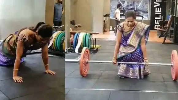 സാരിയില്‍ പുഷ് അപ് ചെയ്ത് യുവതി