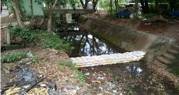 മലമ്പുഴയില്‍ കനാലിലെ കുറ്റിക്കാടും തടയണയും വെള്ളത്തിൻ്റെ ഒഴുക്കിന് തടസ്സമാവുന്നു
