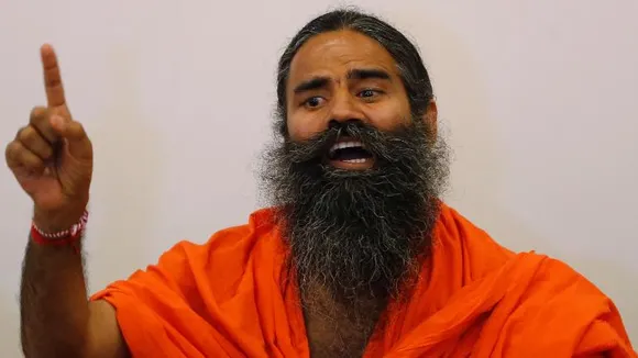 ആർക്കെങ്കിലും ഒരുമിനിറ്റ് നേരം ശ്വാസം പിടിച്ച് നിൽക്കാൻ കഴിയുന്നുണ്ടെങ്കിൽ അതിനർഥം അയാൾ കൊവിഡ് ബാധിതനല്ല എന്നാണ്‌; ബാബാ രാംദേവ്