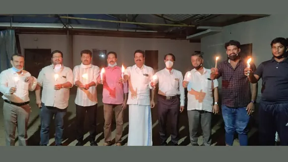 ഒളിമ്പിക് ഐക്യദാർഢ്യ ദീപവുമായി വ്യാപാരികൾ