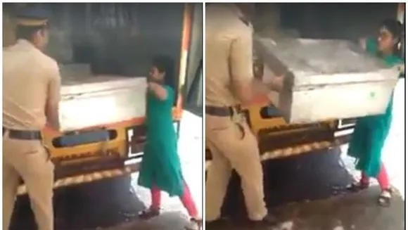 വോട്ടിങ് സാമഗ്രികളുമായെത്തിയ ഭാരമേറിയ പെട്ടി ചുമക്കാന്‍ പൊലീസ് ഉദ്യോഗസ്ഥനെ സഹായിക്കുന്ന ടിവി അനുപമ  ;സോഷ്യല്‍ മീഡിയയുടെ കൈയ്യടി