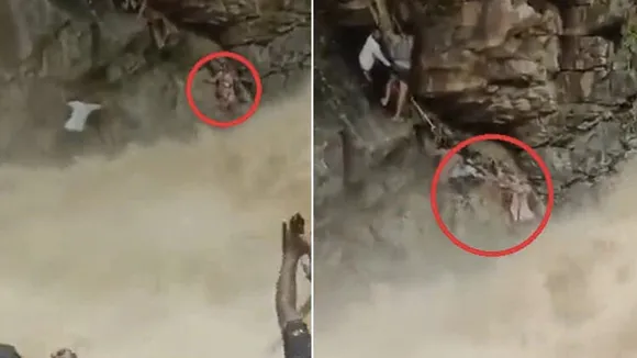 കുത്തിയൊലിച്ചുവരുന്ന മലവെള്ളപ്പാച്ചിൽ: മരണത്തെ മുഖാമുഖം കണ്ട് അമ്മയും കൈക്കുഞ്ഞും, സാഹസികമായ രക്ഷപെടുത്തൽ, വീഡിയോ വൈറൽ