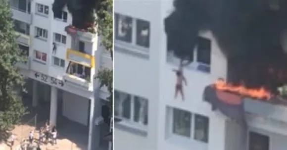 കെട്ടിടത്തില്‍ തീ പിടിച്ചപ്പോള്‍ മൂന്നാം നിലയില്‍ നിന്ന് താഴേക്ക് ചാടി മൂന്നു വയസുകാരനും 10 വയസുകാരനും; 40 അടി മുകളില്‍ നിന്ന് ചാടിയ സഹോദരങ്ങളെ കൃത്യമായി പിടിച്ച് രക്ഷാപ്രവര്‍ത്തകരും; വീഡിയോ വൈറല്‍