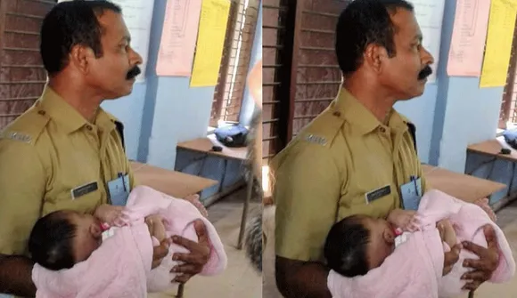അമ്മ വോട്ട് ചെയ്ത് വരുന്നവരെ കരുതലിന്റെ കരങ്ങളില്‍ സുരക്ഷിതമായി കുഞ്ഞ്  - സോഷ്യല്‍ മീഡിയയില്‍ കൈയ്യടി നേടി പോലീസുകാരന്‍