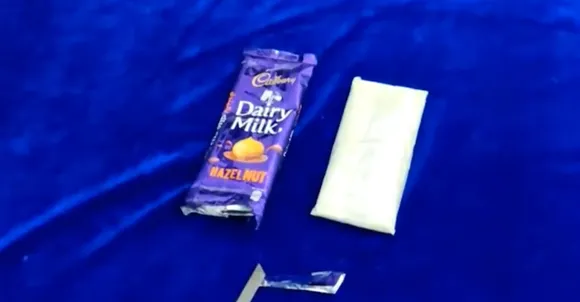 കാഡ്ബറി ഡയറി മില്‍ക്ക് ചോക്ലേറ്റിന്റെ രൂപത്തില്‍ സ്വര്‍ണക്കടത്ത് ! യാത്രക്കാരന്റെ അടിവസ്ത്രത്തില്‍ നിന്നും പിടിച്ചെടുത്തത് 28 .7 ലക്ഷം രൂപ വിലയുള്ള 'സ്വര്‍ണ കാഡ്ബറി ഡയറിമില്‍ക്ക്' !‌