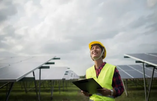 women working at solar farm