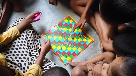 board games snakes and ladders family play