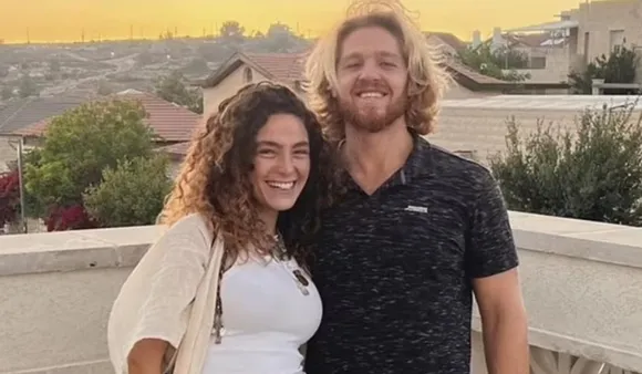 israel hamas music festival attack woman lay on top of boyfriends dead body