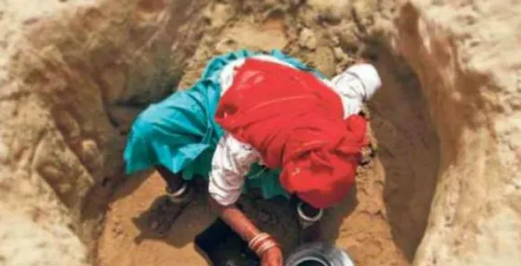 Tribal woman digs well in UP village
