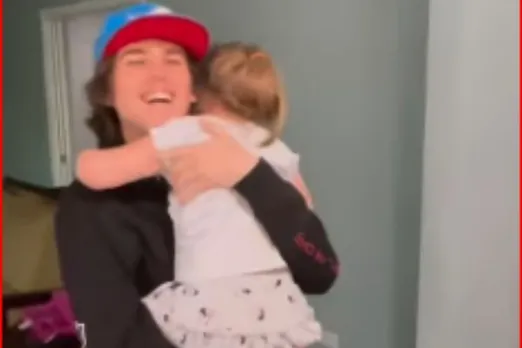 girl reunites with brother