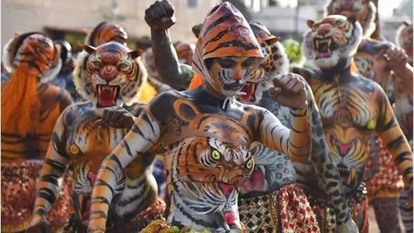 Women participating in the Pulikali festivities
