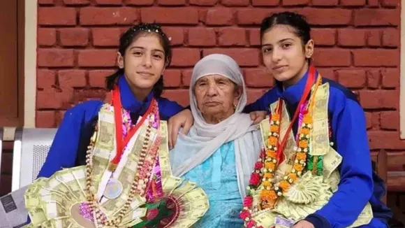 Twin Sisters Win Medals