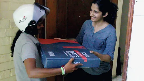 Even Cargo women rider delivers a package