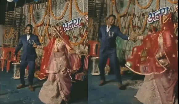 Cute bride and groom dancing video
