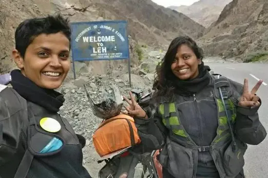 Two women two bikes