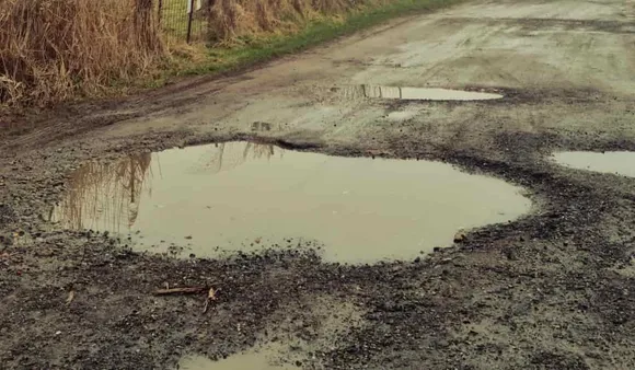 Teenager Repairs Pothole