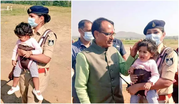 woman cop with daughter on duty