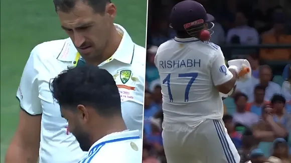 Mitchell Starc rushes towards Rishabh Pant 