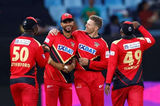 Ali-Naseer-and-Lockie-Ferguson-celebrating-with-teammates