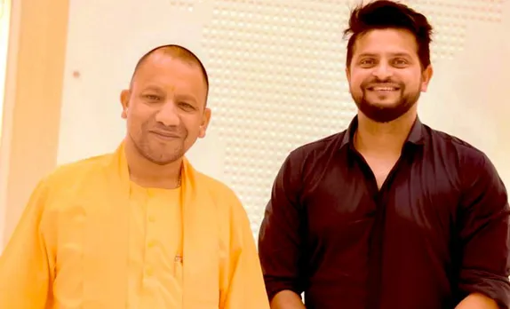 Yogi Adityanath and Suresh Raina
