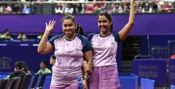 ndia's Sutirtha Mukherjee (L) and Ayhika Mukherjee (R)