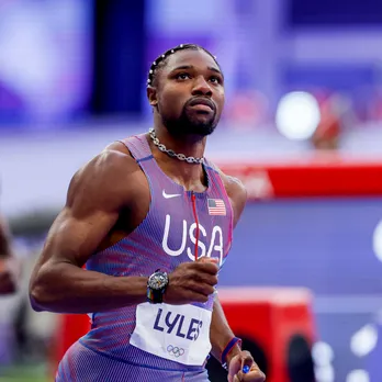 Noah Lyles wins 100m gold by five thousandths of a second
