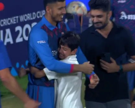 Mujeeb Ur Rahman hugs youn fan