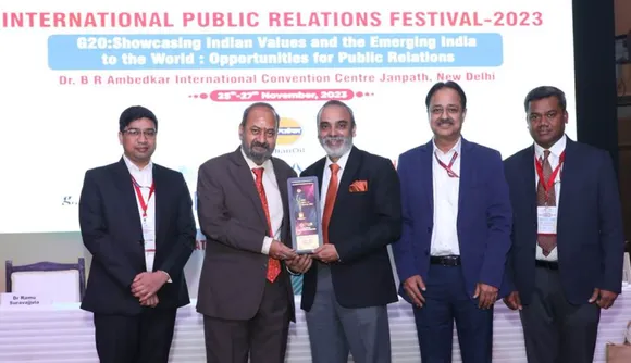 Director , NHPC, Shri Uttam Lal with the trophy conferred on NHPC
