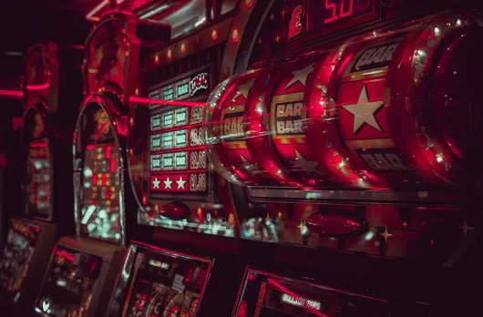 https://unsplash.com/photos/close-up-photography-of-lucky-arcade-with-bar-bar-and-star-7H7KVCihBvI
