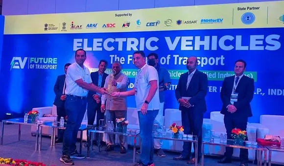 TelioEV team recieving the award..