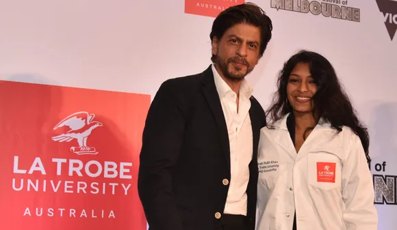 Shah Rukh Khan with Gopika Kottantharayil Bhasi – recipient of the inaugural Shah Rukh Khan La Trobe University PhD Scholarship, awarded in 2020)