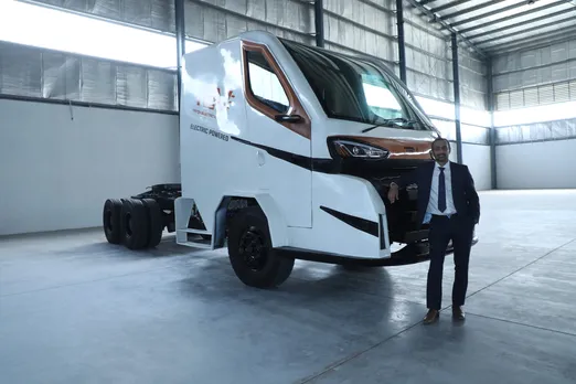Himanshu Patel with Triton Electric Truck