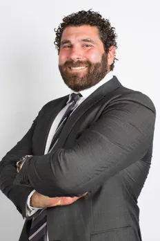 Qlik, Charlie Farah