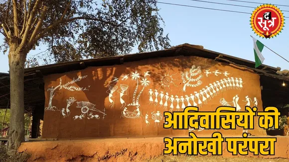 tribals Painting walls during Diwali culture