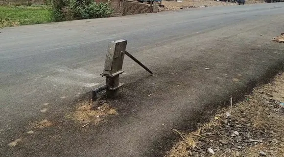 hand pump stands in Middle road
