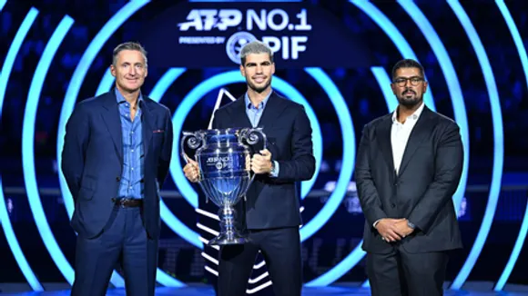 'Really proud', says Carlos Alcaraz as he accepts ATP Year-End No. 1 trophy at the ATP Finals in Turin on Friday. Photo credit: ATP Tour