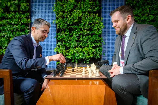 Olympic gold medallist Abhinav Bindra takes a shot at chess, makes ceremonial first move in the FIDE World Cup 2025 final between Wei Yi and Javokhir Sindarov in Panaji, Goa, on Monday. Photo credit: FIDE