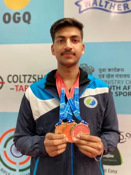 Suraj Sharma sweeps senior and junior 25m rapid fire pistol titles in the 68th National Shooting Championship Competitions at the Dr. Karni Singh Shooting Range in New Delhi on Friday. Photo credit: NRAI