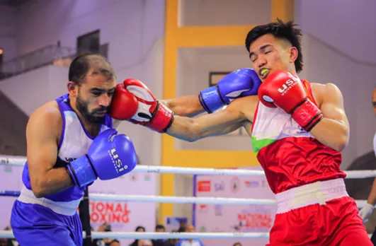 Jadumani Singh, Pawan Bartwal set up final clash with easy semifinal victories in the Elite Men and Women National Boxing Championships at Gautam Buddha University, Greater Noida, on Friday. Photo credit: BFI
