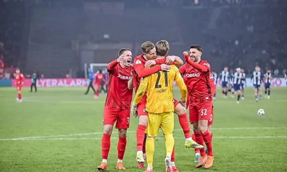 Freiburg advance to German Cup semis after shootout drama