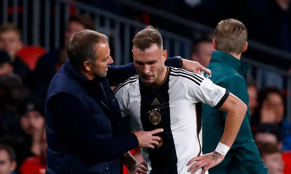 Hansi Flick and David Raum