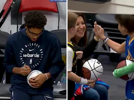WATCH: Jordan Poole treats young fans by signing autographs