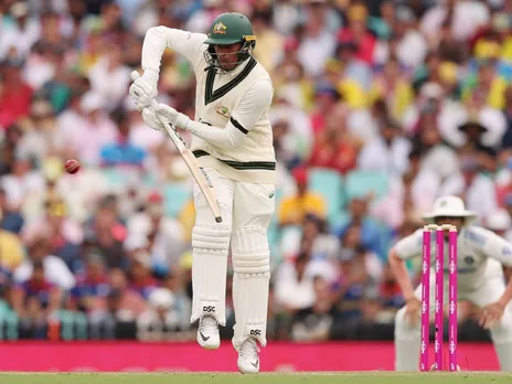 Why is Usman Khawaja wearing black arm band?