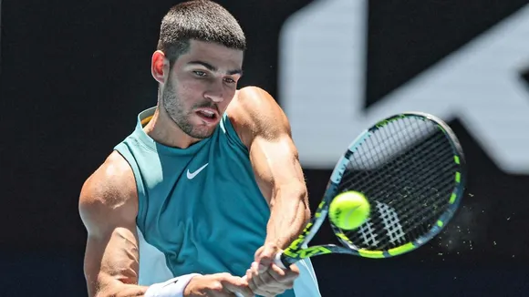 Carlos Alcaraz battles into fourth round