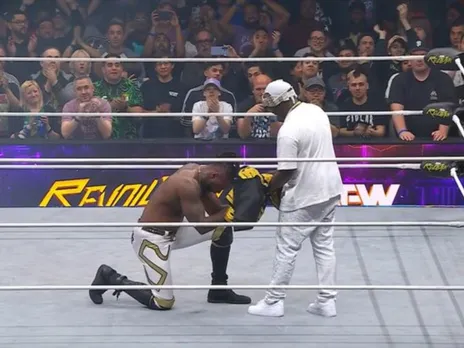WATCH: Swerve Strickland bows on his knees and hands over robe to Prince Nana at AEW Revolution