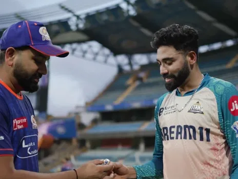 Rohit Sharma giving special ring to Mohammed Siraj